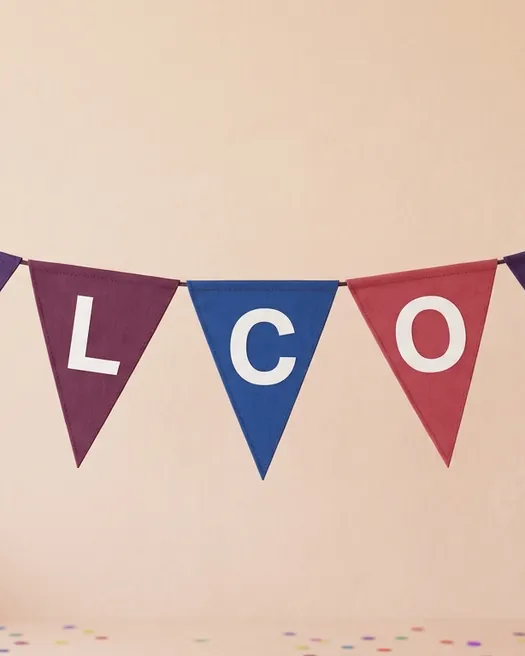 Only the middle of the banner is left, so the flags show just the letters L, C and O.